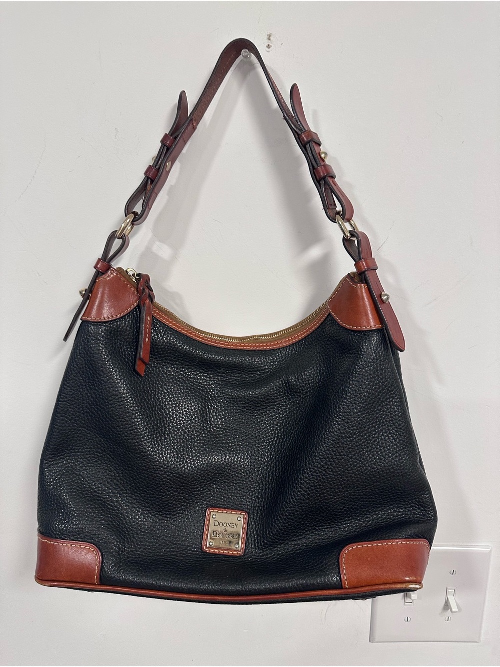 Dooney & Bourke Black Leather Shoulder Bag with Brown Trim and Gold Hardware
